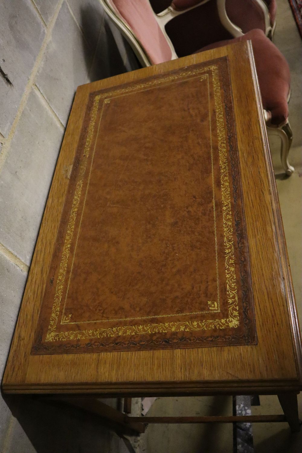 A late Victorian oak kneehole desk, width 90cm depth 53cm height 75cm